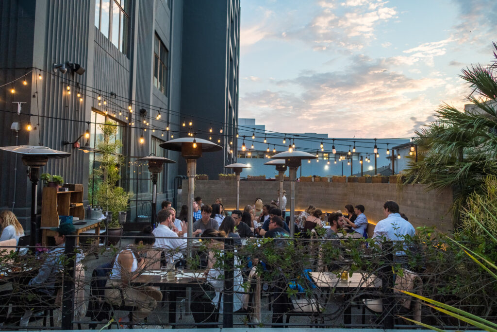 Guests sit on the spacious outdoor patio